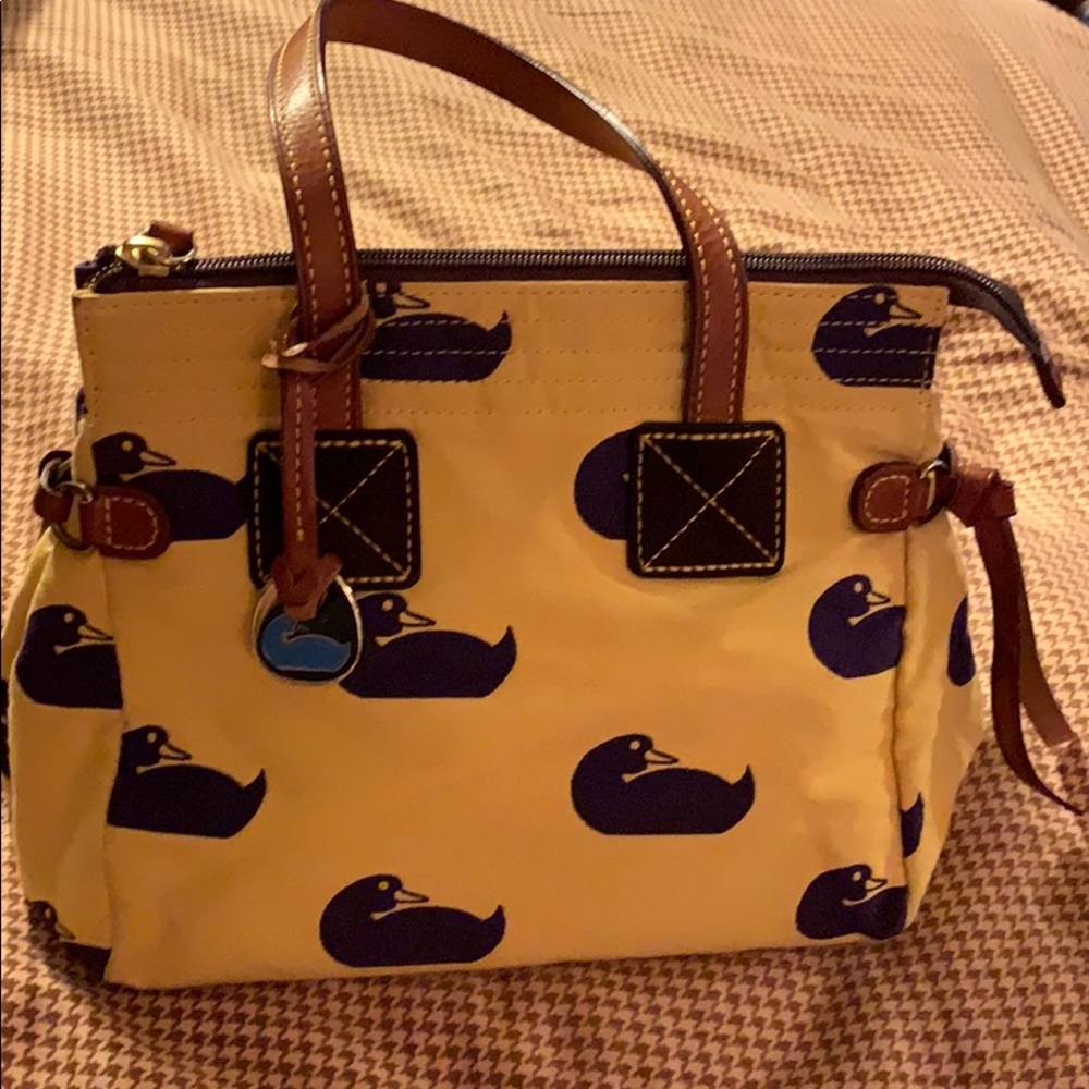 Small Dooney and Burke handbag. Cloth exterior.